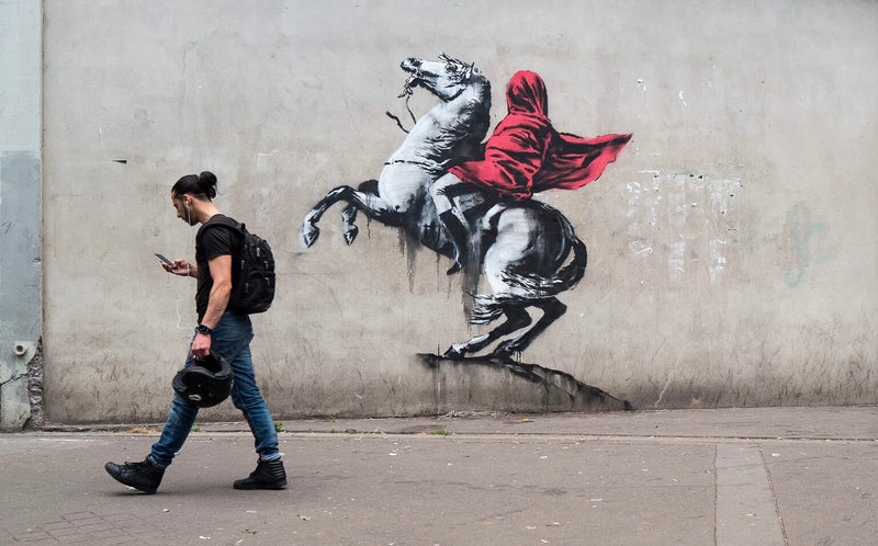 Paris's Fashion Empire Built on Stencil Cutters vs. Banksy's Solo Approach
