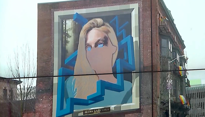 A Providence Mural Honoring a Murdered Refugee Got Torn Down Half-Finished. The Artist Rebuilt It Three Miles Away.