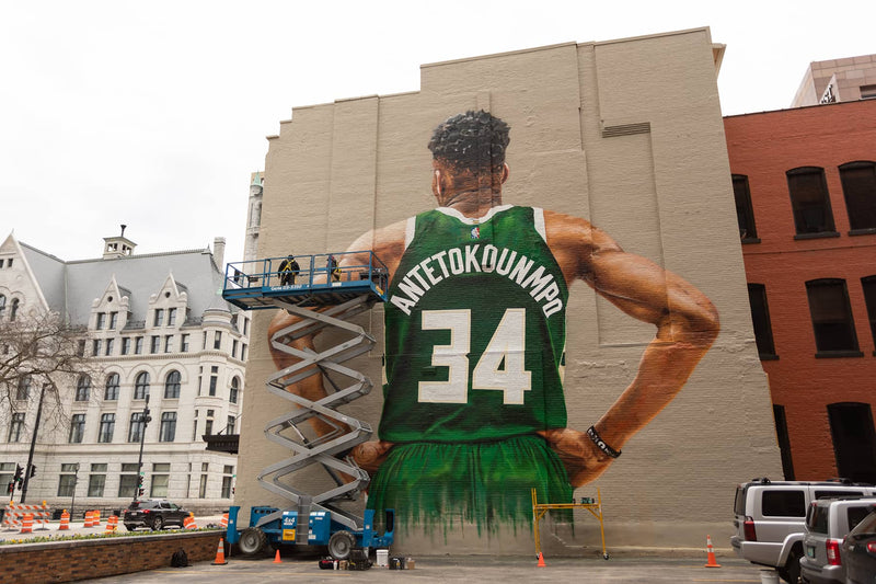 Milwaukee Gave a Dead Broadcaster Its Tallest Wall. The Painter Already Watched One Sports Mural Get Defaced.