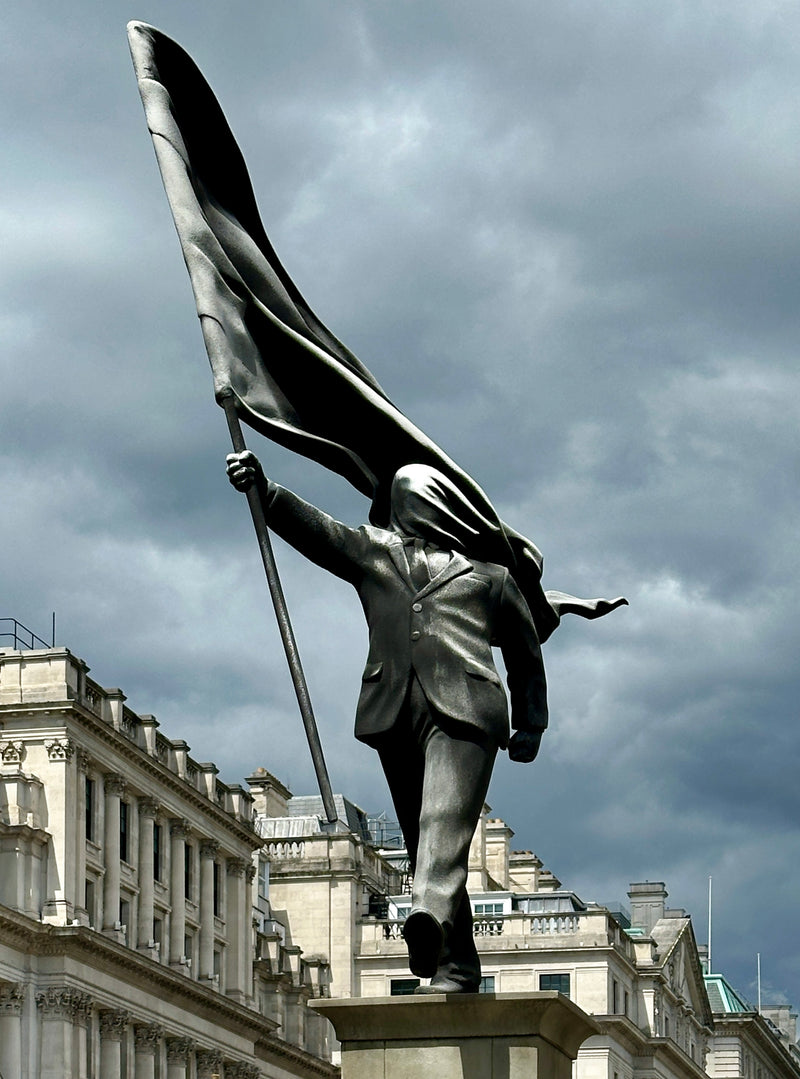 Banksy Left a Blindfolded Man Falling Off a Ledge in London's Most Imperial Square. Ten Weeks Later, He's Still Falling.