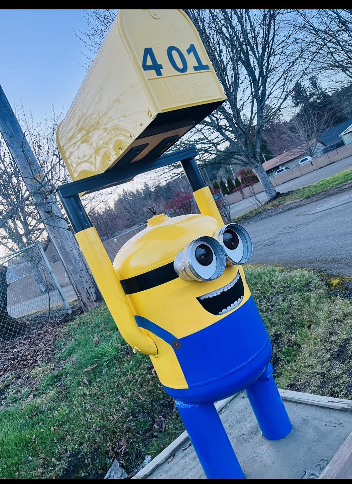 Salford's Minion Man Paints Over Obscenity With Colorful Cartoons