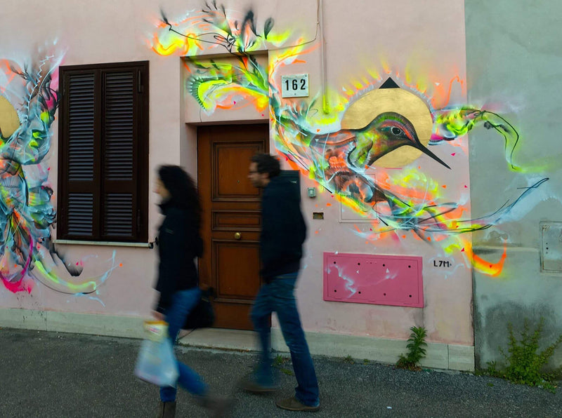 Brazilian Artist L7M Sprinkles Gold Birds Across Rome's Streets