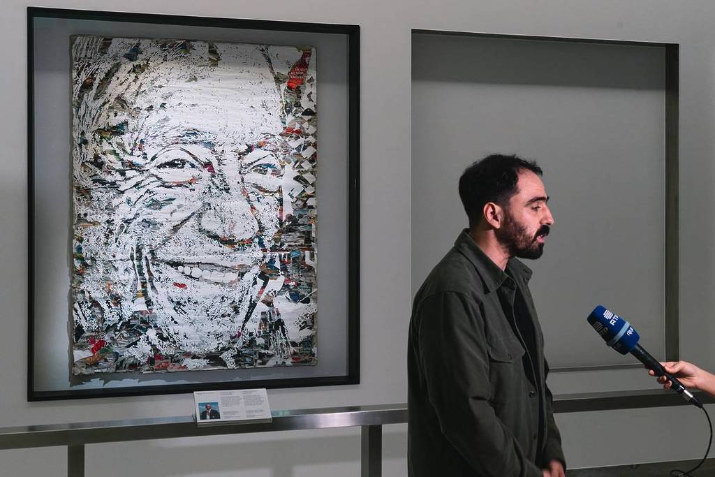 Portugal's President Needed an Official Portrait. He Hired the Street Artist Who Drills Faces Out of Walls.
