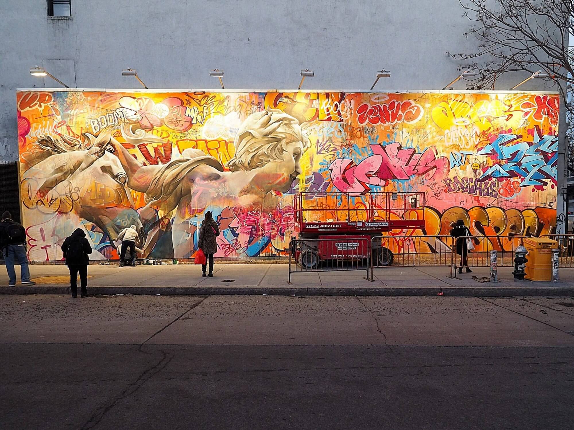 Keith Haring Started This Wall in 1982. It Took an Uninvited Artist With a Scissor Lift to Keep It Alive.