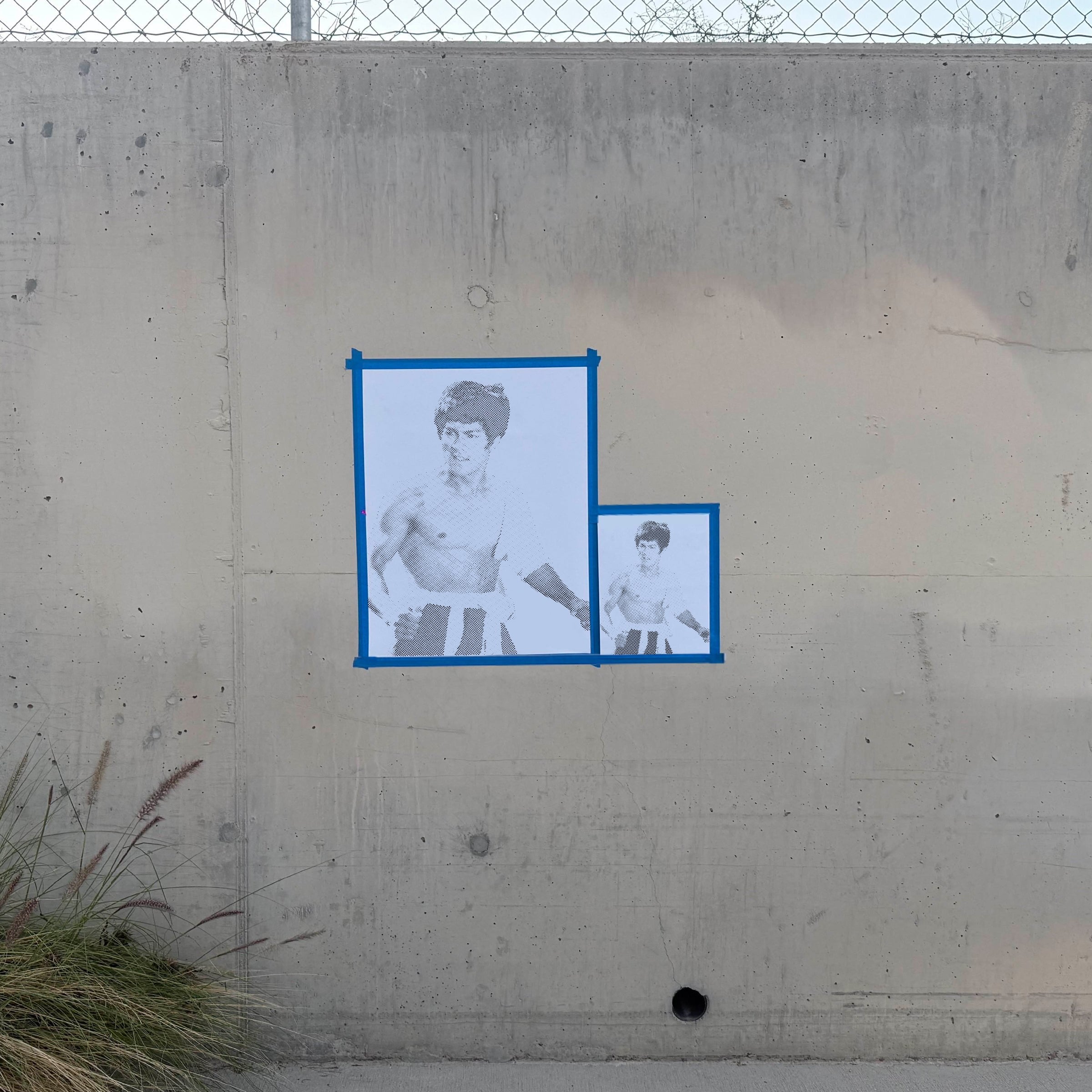 Bruce Lee halftone stencil sprayed on a wall