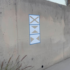 Jamaica Flag stencil pack on a wall, second angle