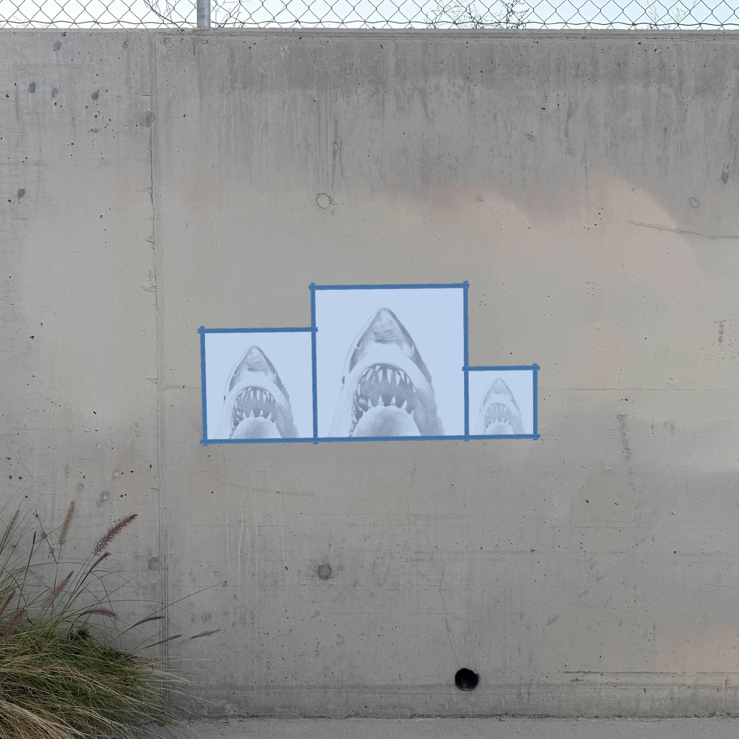 Jaws Shark Fin halftone stencil sprayed on a wall