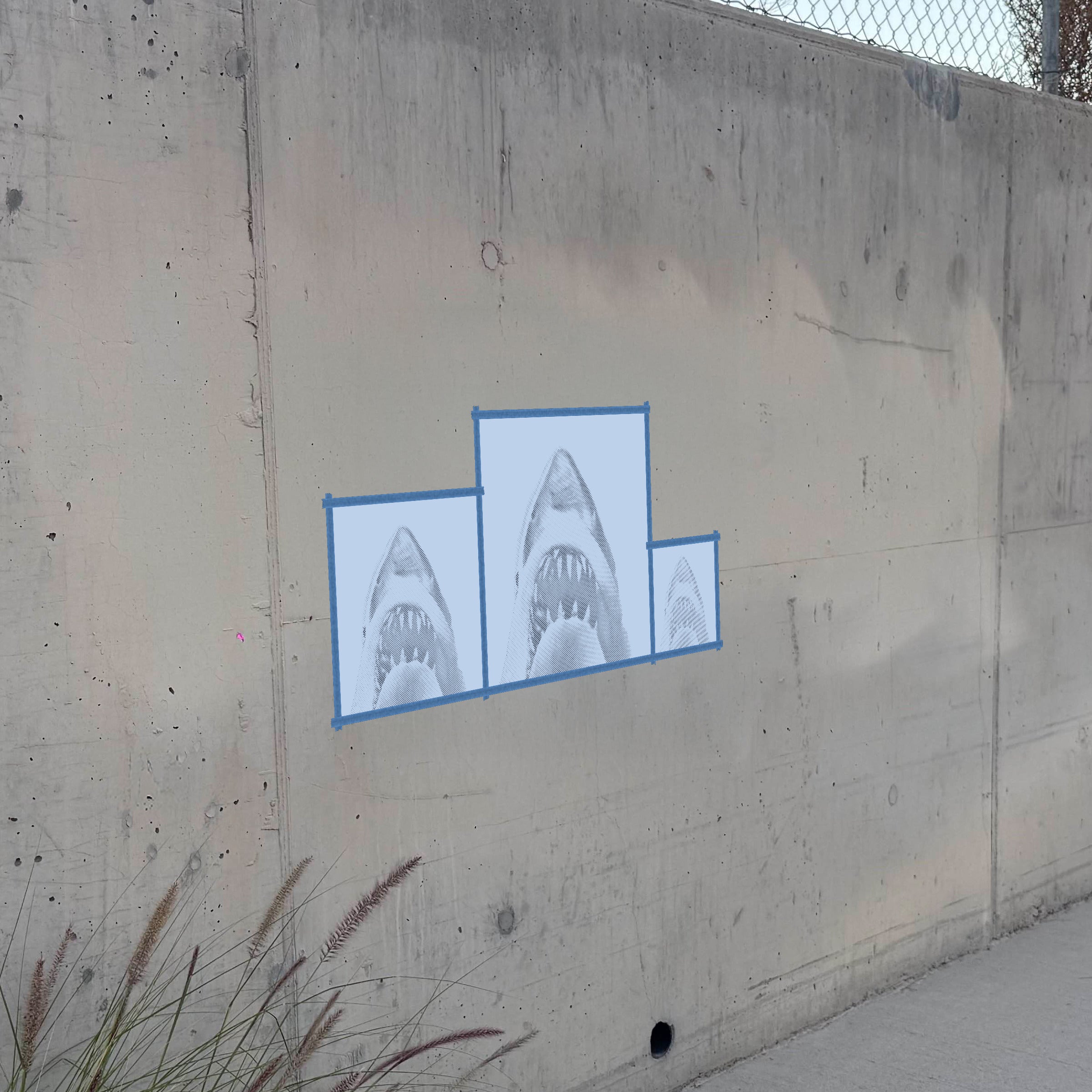 Jaws Shark Fin halftone stencil on a wall, second angle