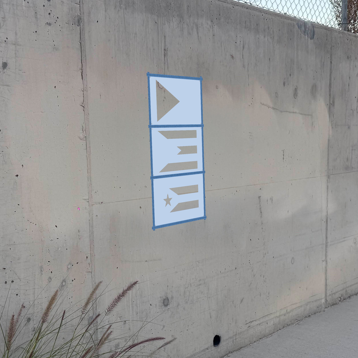 Puerto Rico Flag stencil pack on a wall, second angle