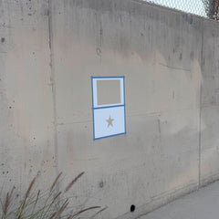 Vietnam Flag stencil pack on a wall, second angle